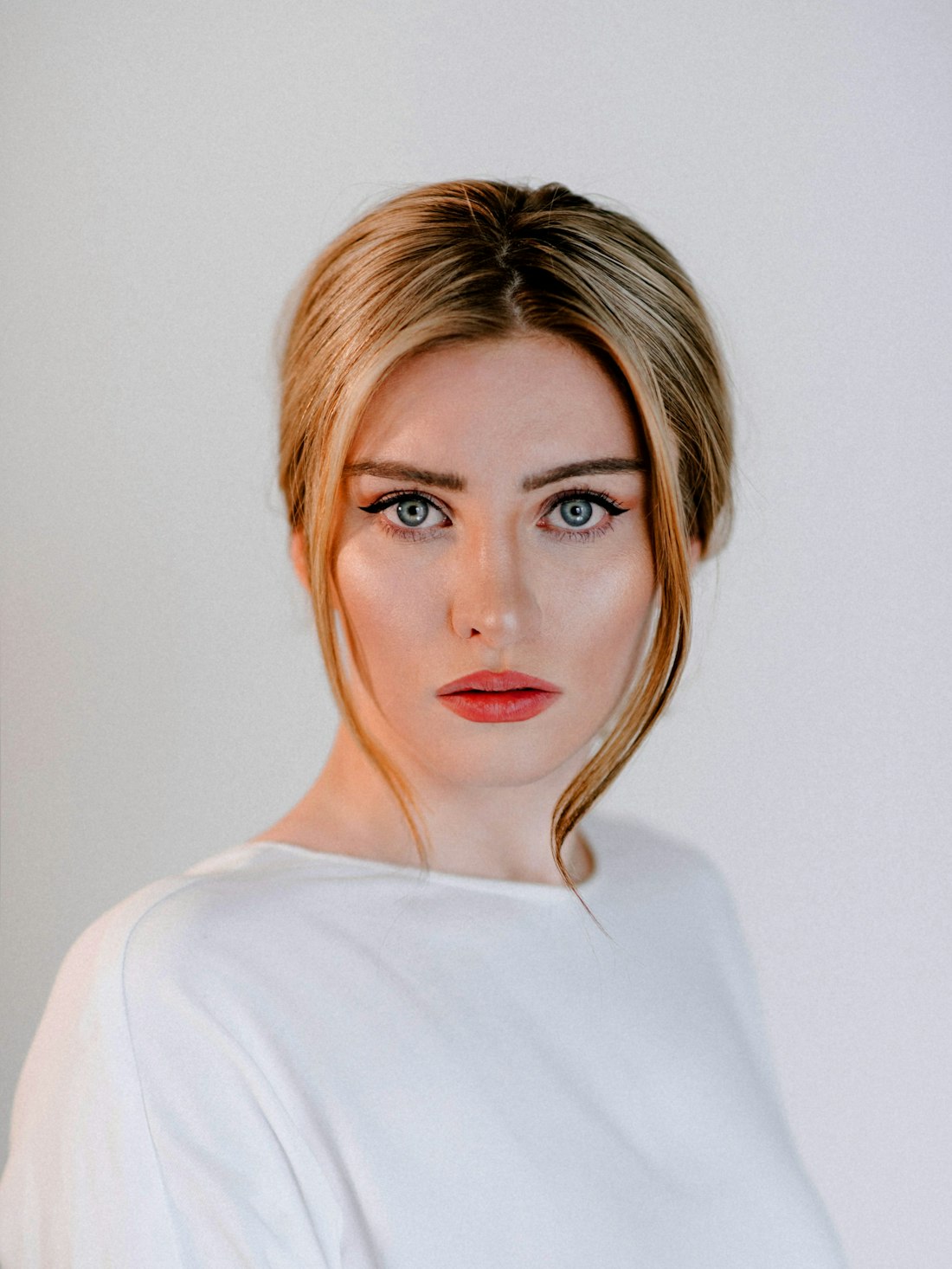 Creator with soft clean-girl makeup (temporary comp)